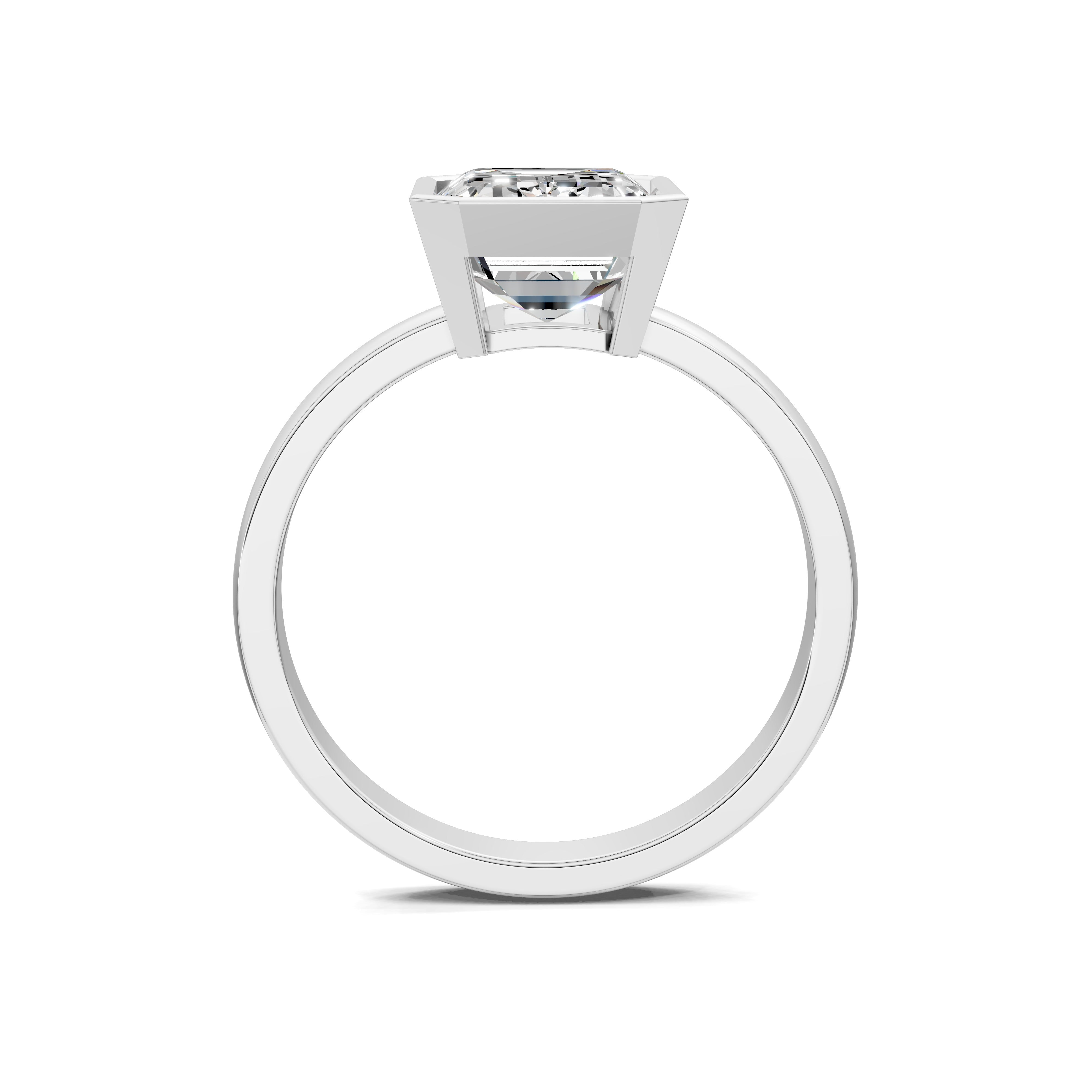 The Orion Bezel Emerald Ring