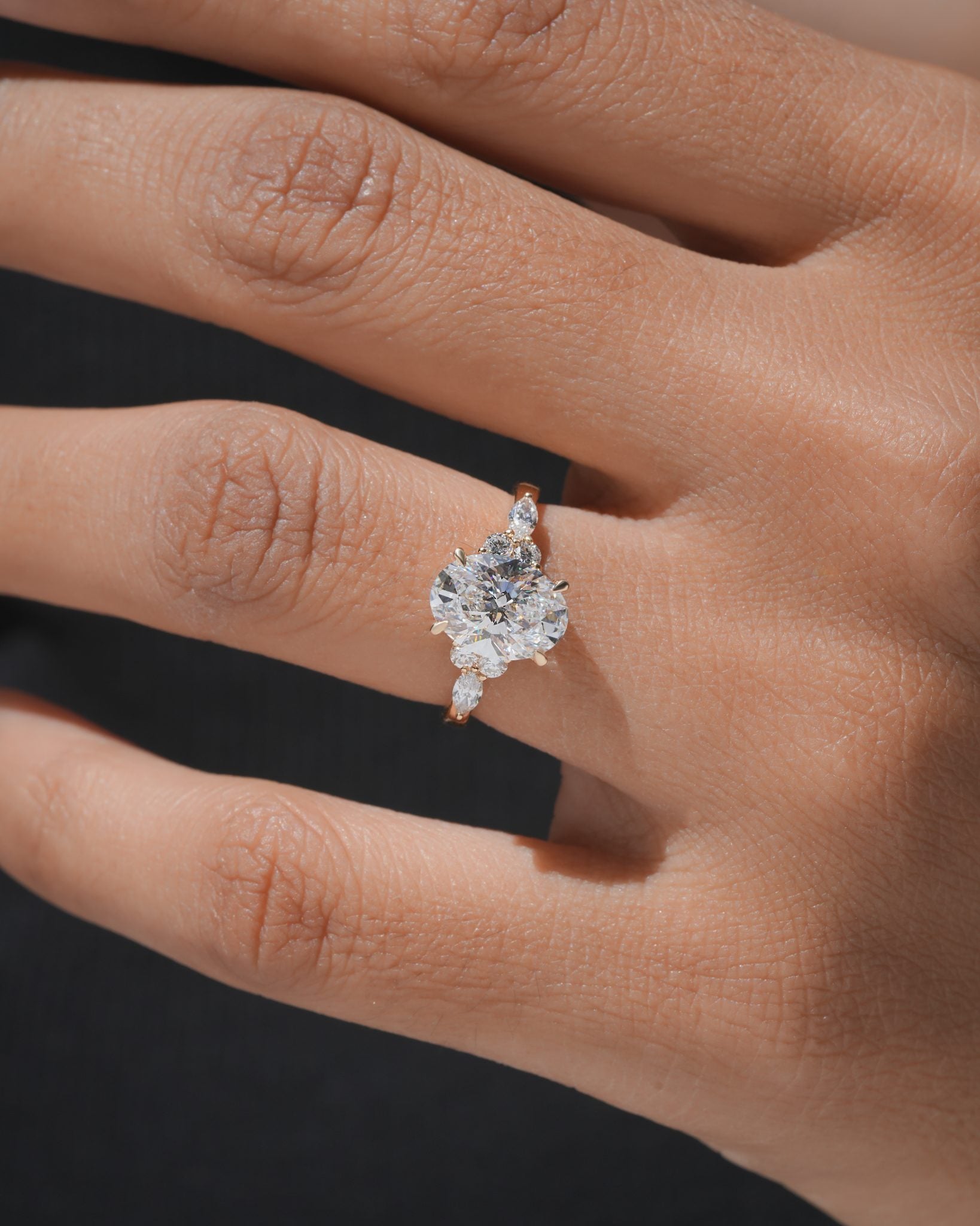 Nyra with Pear Accents and Round Shoulder Stones Ring