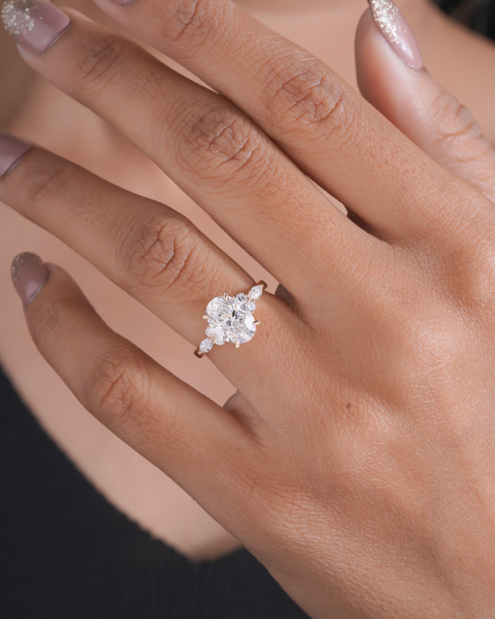 Nyra with Pear Accents and Round Shoulder Stones Ring
