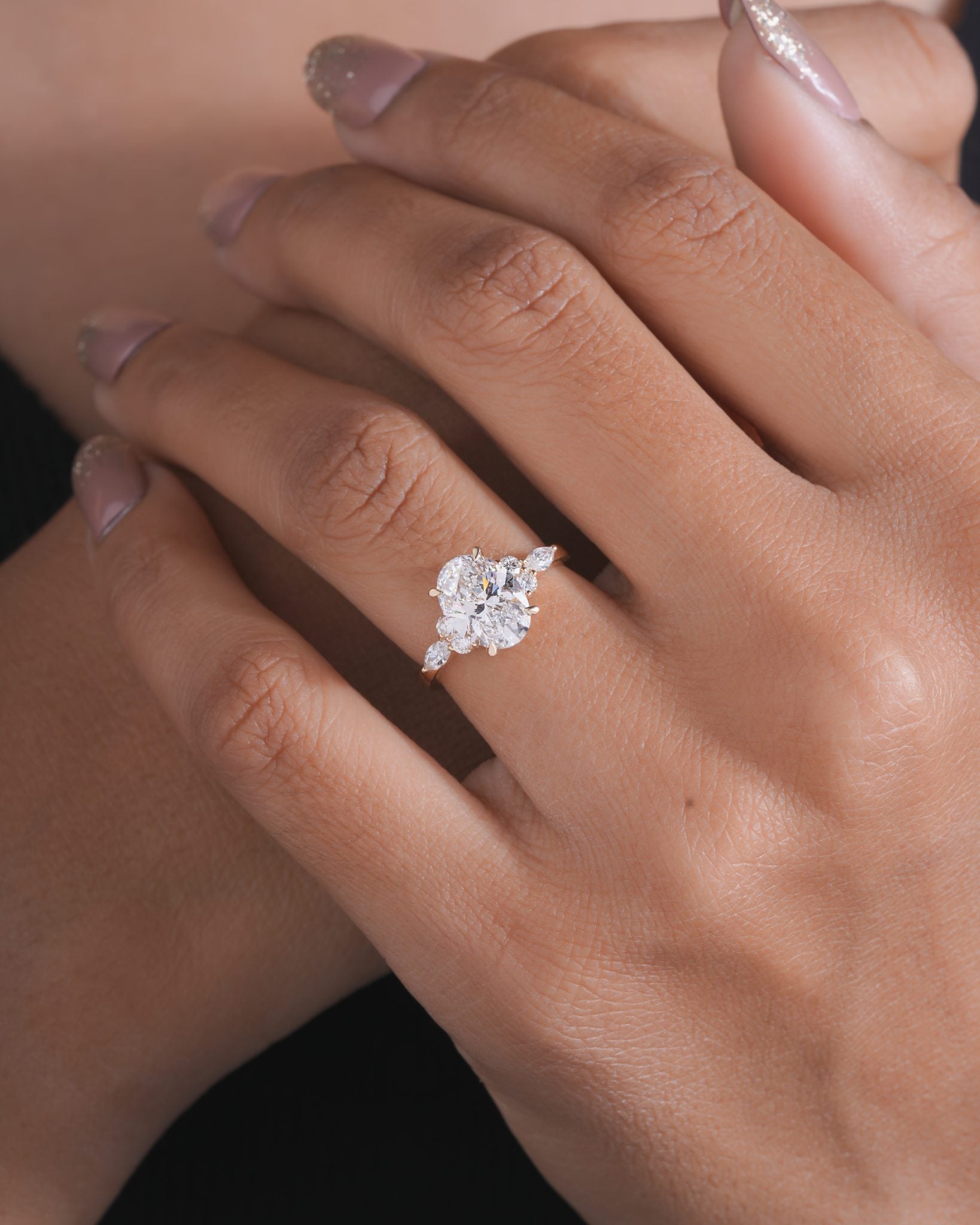 Nyra with Pear Accents and Round Shoulder Stones Ring