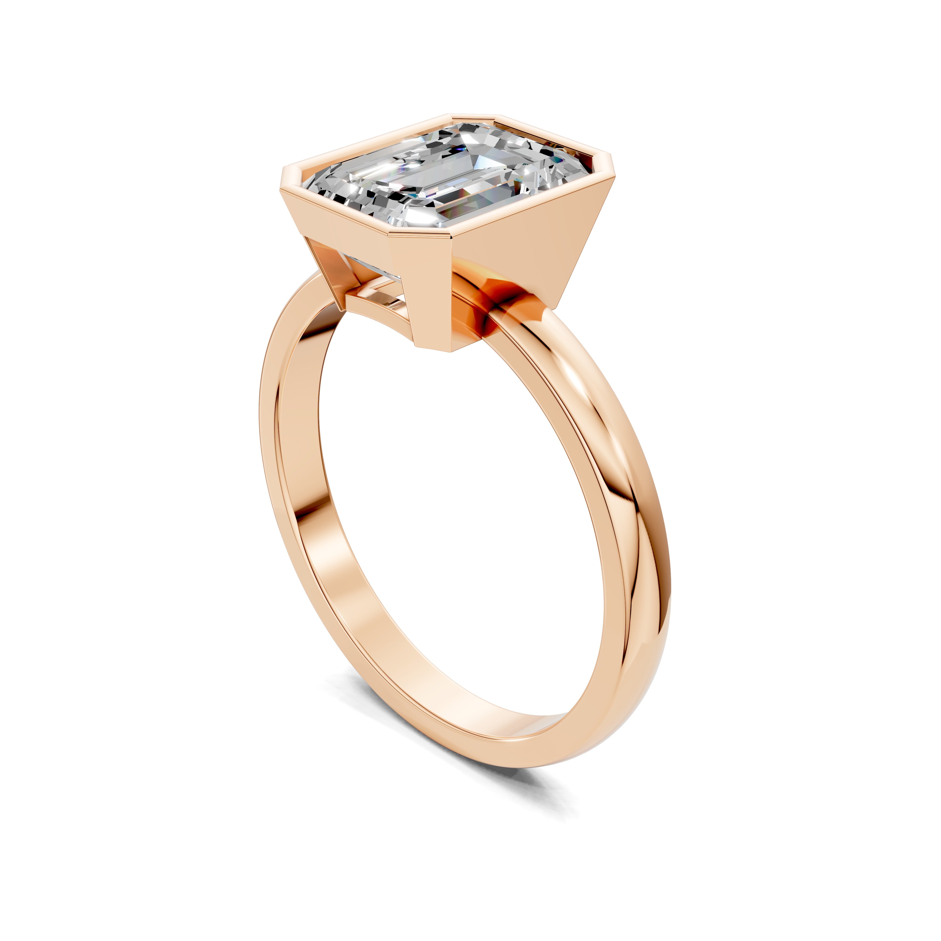 The Orion Bezel Emerald Ring