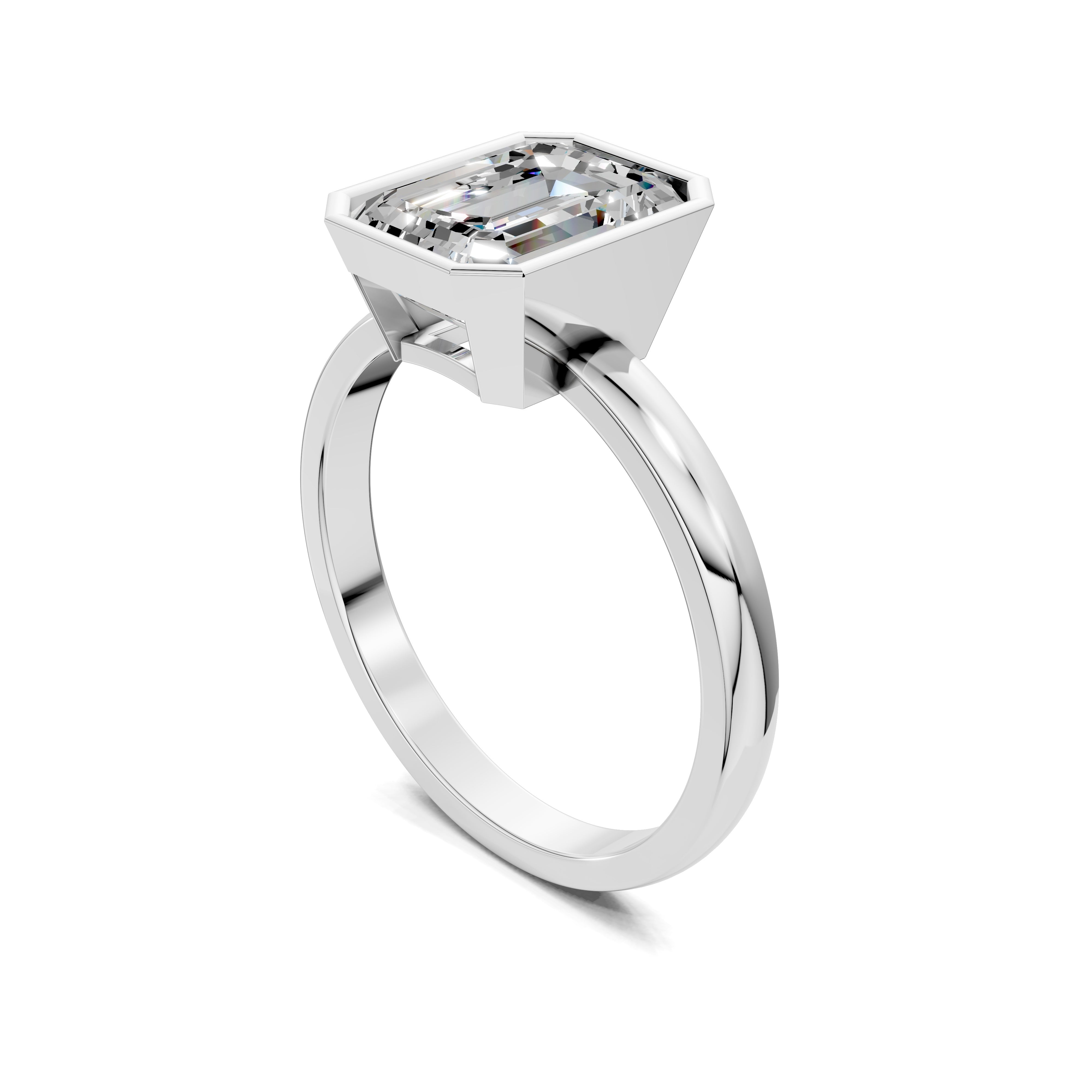 The Orion Bezel Emerald Ring