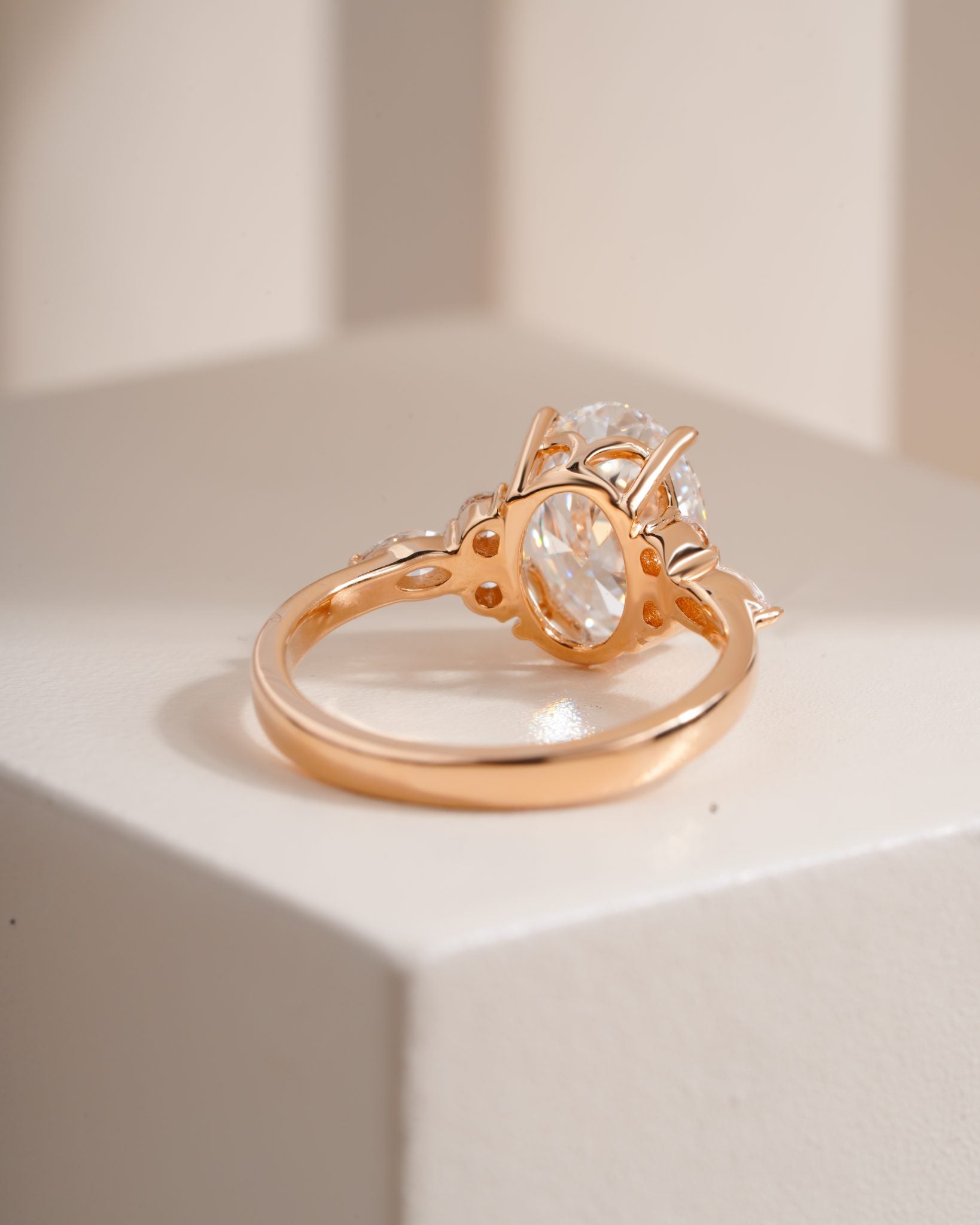 Nyra with Pear Accents and Round Shoulder Stones Ring