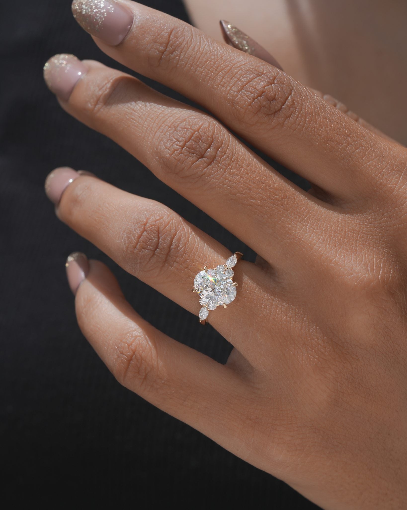 Nyra with Pear Accents and Round Shoulder Stones Ring