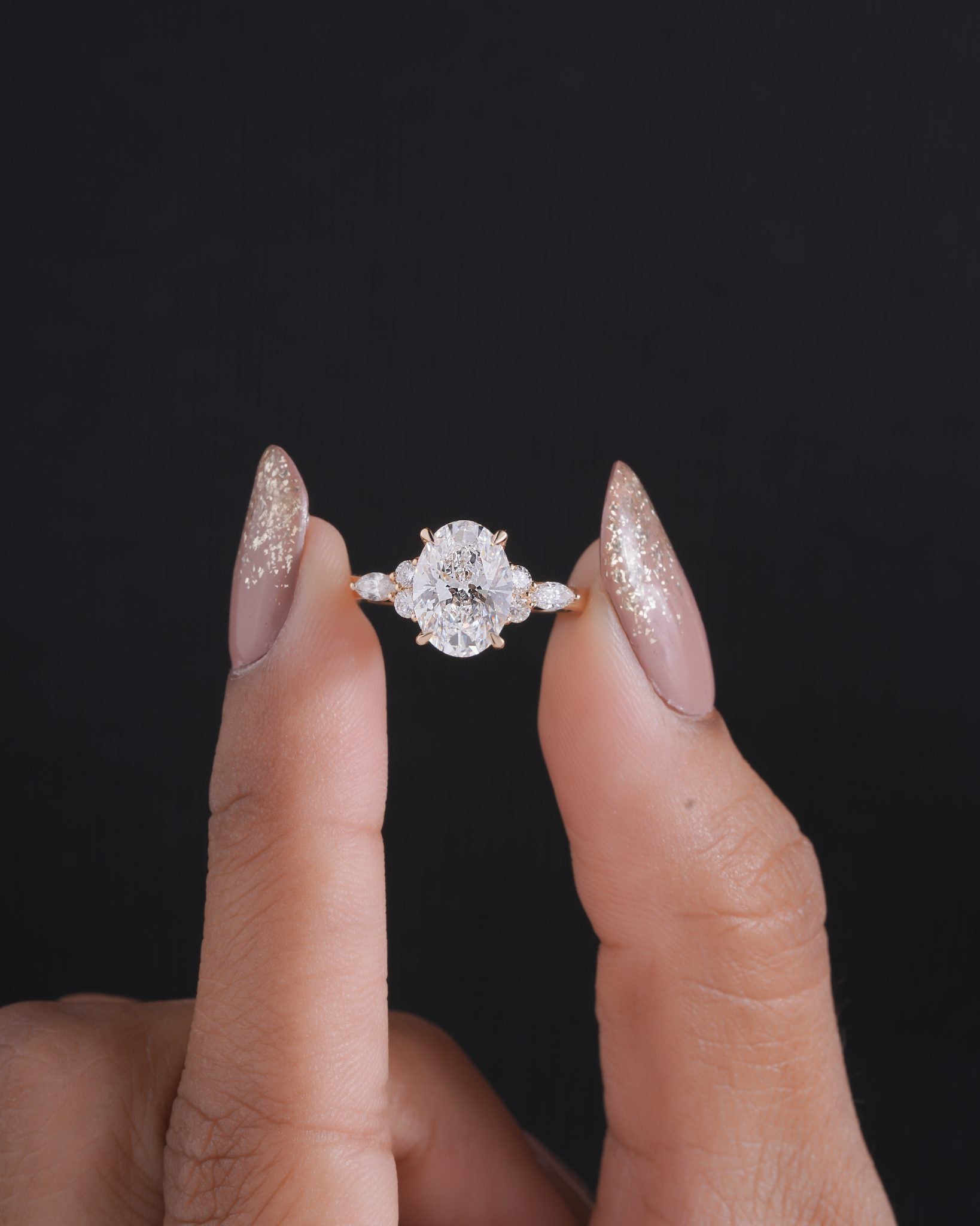 Nyra with Pear Accents and Round Shoulder Stones Ring