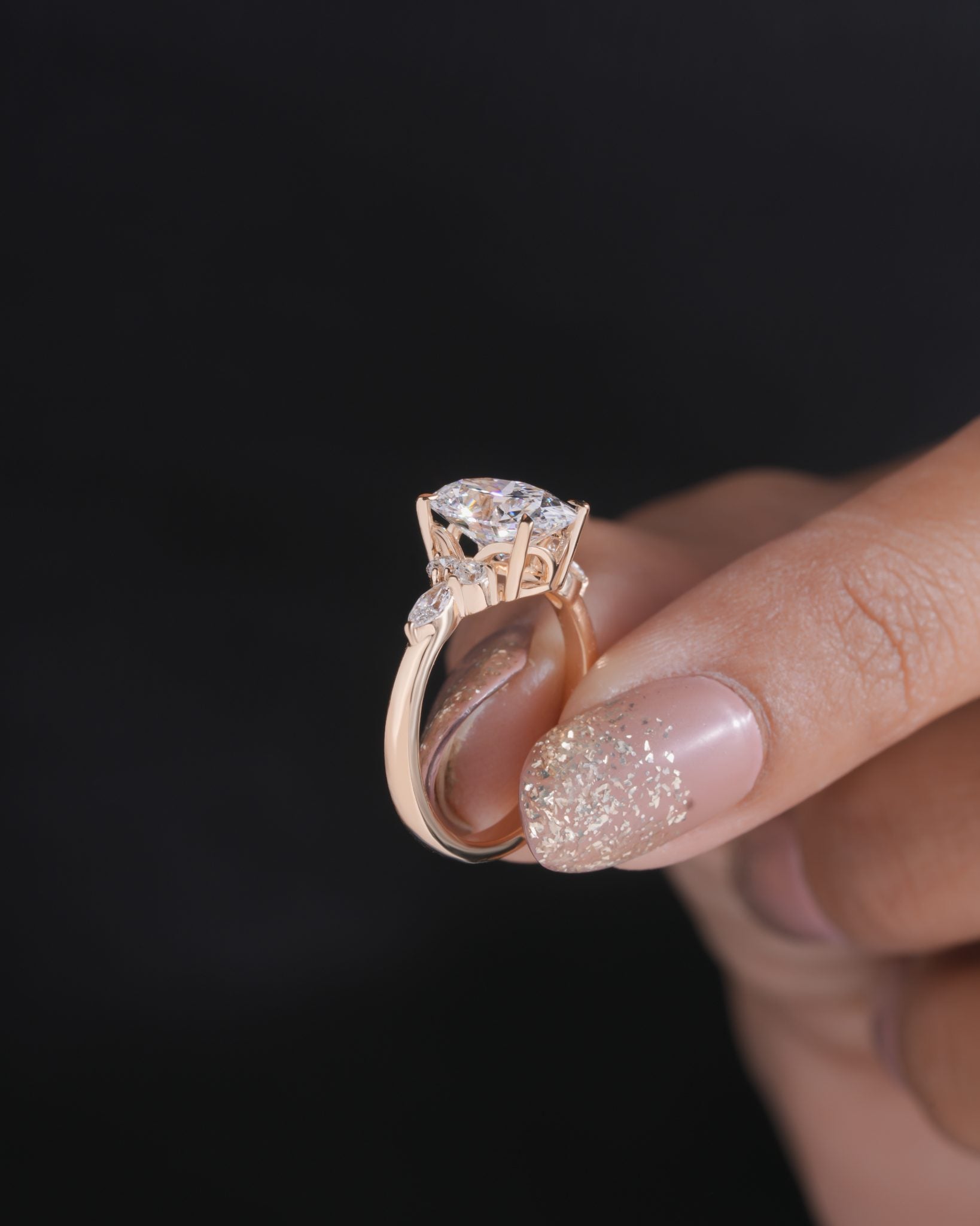 Nyra with Pear Accents and Round Shoulder Stones Ring